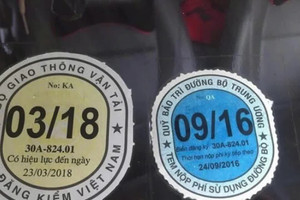 Chính thức bỏ dán tem thu phí đường bộ trên kính ô tô