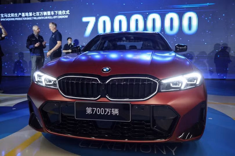 Buổi lễ đánh dấu sự ra mắt chiếc xe thứ 7 triệu do BMW Brilliance Automotive (BBA) sản xuất tại Thẩm Dương, tỉnh Liêu Ninh, Đông Bắc Trung Quốc. Ảnh: Xinhua.