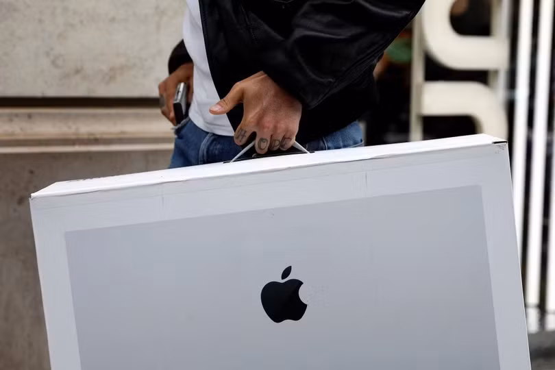 Apple sắp chạm đến cột mốc vốn hoá 5.000 tỷ USD. Ảnh: Reuters.