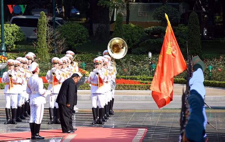 hinh anh le don tong bi thu chu tich nuoc lao tham chinh thuc viet nam
