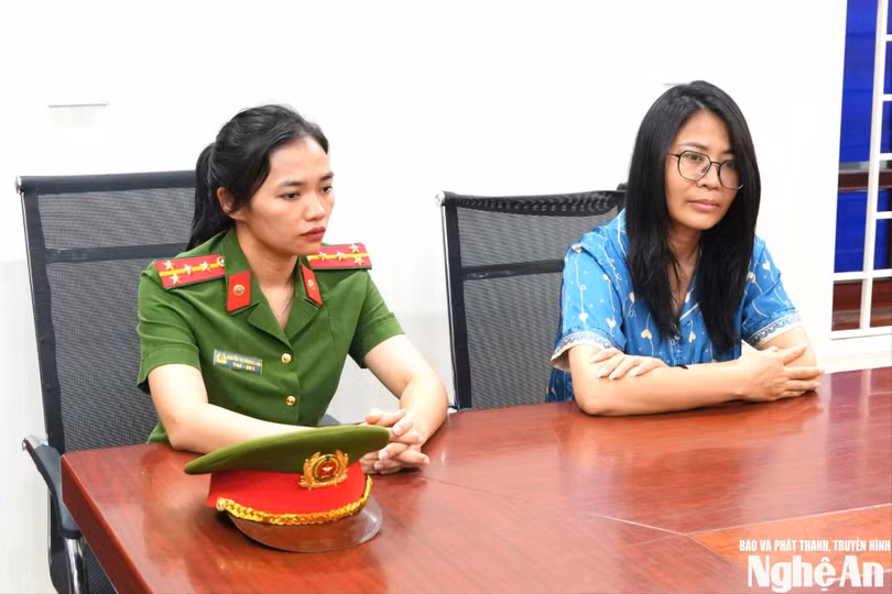 Cơ quan Công an làm việc với đối tượng Lê Thị Dung. Ảnh: Trọng Tuấn