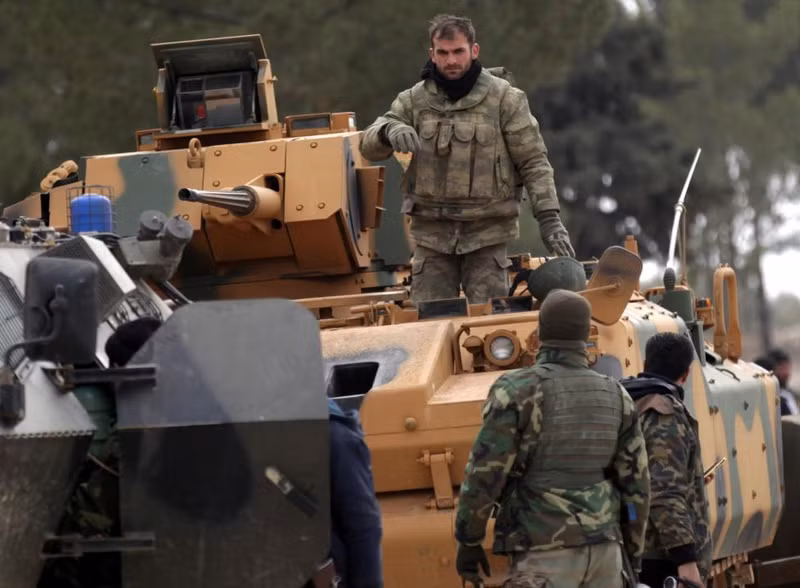 photo phien quan is o syria bi bao vay hoan toan o al bab
