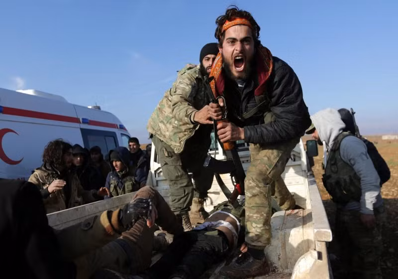 photo phien quan is o syria bi bao vay hoan toan o al bab