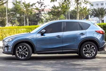 CX-5, mẫu xe đi đầu trào lưu giảm giá bất ngờ, khó đoán. khach viet hoang mang vi gia oto bien dong that thuong