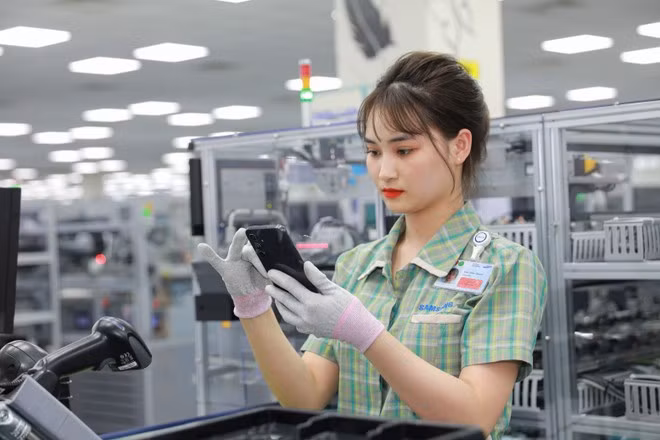 Mức thuế đối ứng 20%, kim ngạch xuất khẩu giảm khoảng 9-10% và tác động cuối cùng là làm GDP giảm khoảng 0,8 điểm phần trăm. (Ảnh: Vietnam+)