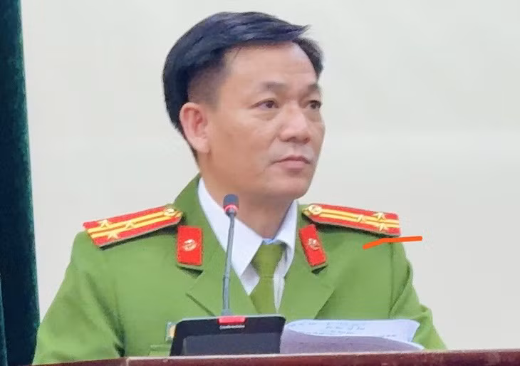 Đại diện Công an Hà Nội thông tin về vụ án - Ảnh: DANH TRỌNG