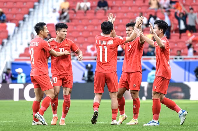 Đội tuyển Việt Nam ăn mừng sau khi ghi bàn trong trận thua Nhật Bản 2-4 ở vòng bảng Asian Cup 2023. Ảnh: AFC.