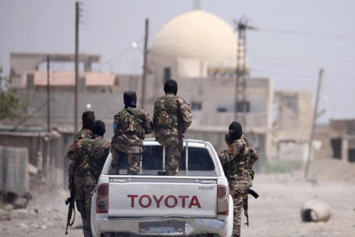 photo cuoc chien quet sach is tai thanh tri raqqa