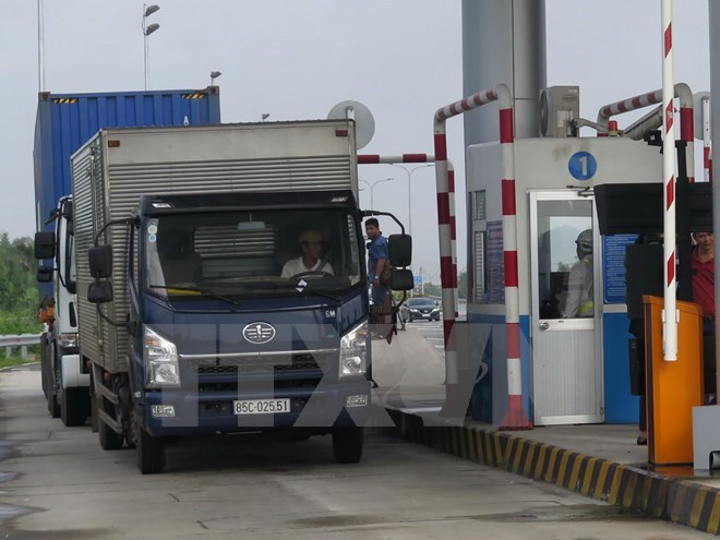 chinh thuc giam phi duong bo tren ql 1 cho xe tai container