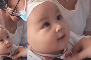 Em bé liên tục nháy mắt với bác sĩ khi tiêm thuốc