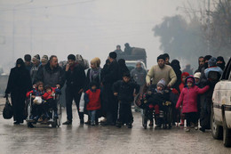 [Photo] Người dân Aleppo tháo chạy khỏi vùng chiến sự