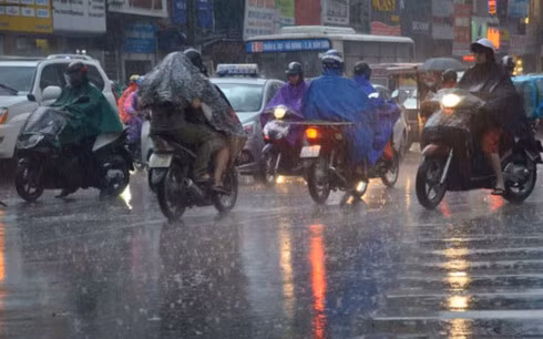 Khu vực Hà Nội có mưa to (Ảnh: PLO) thoi tiet hom nay mien trung nang nong mien bac mua dam de