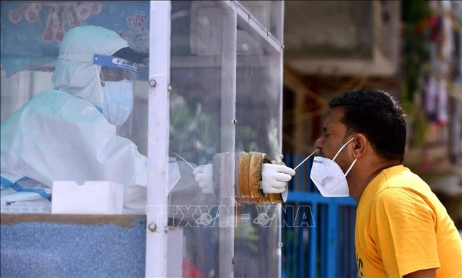 Thế giới ghi nhận trên 30,4 triệu ca mắc, 951.695 ca tử vong do COVID-19