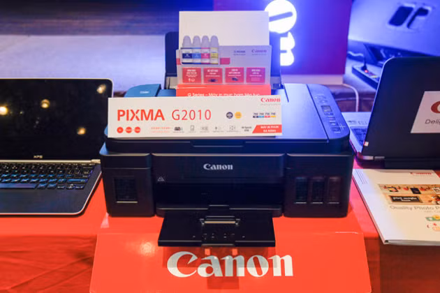 canon trinh lang loat may in phun va laser moi