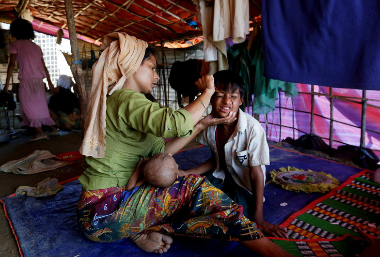 Cậu bé tị nạn 12 tuổi nuôi cả gia đình ảnh 8 cau be ti nan 12 tuoi nuoi ca gia dinh