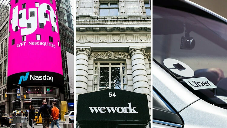 Logo Lyft, WeWork và Uber trên đường phố Mỹ. Ảnh: NYT Những biến động của kinh tế thế giới 2019