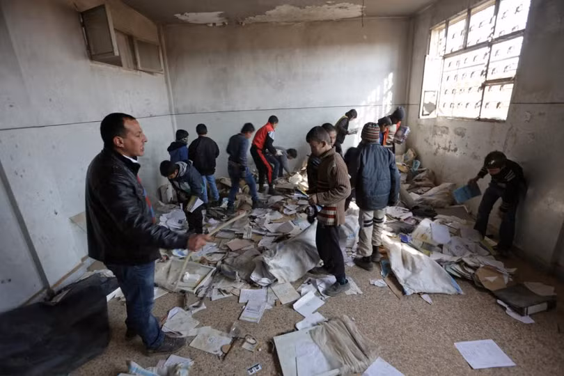 photo is thao chay tre em syria quay tro lai truong