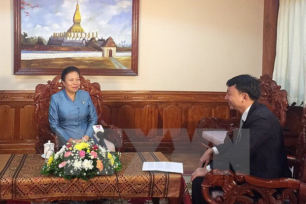 chuyen tham cua tong bi thu nang quan he viet lao len tam cao moi