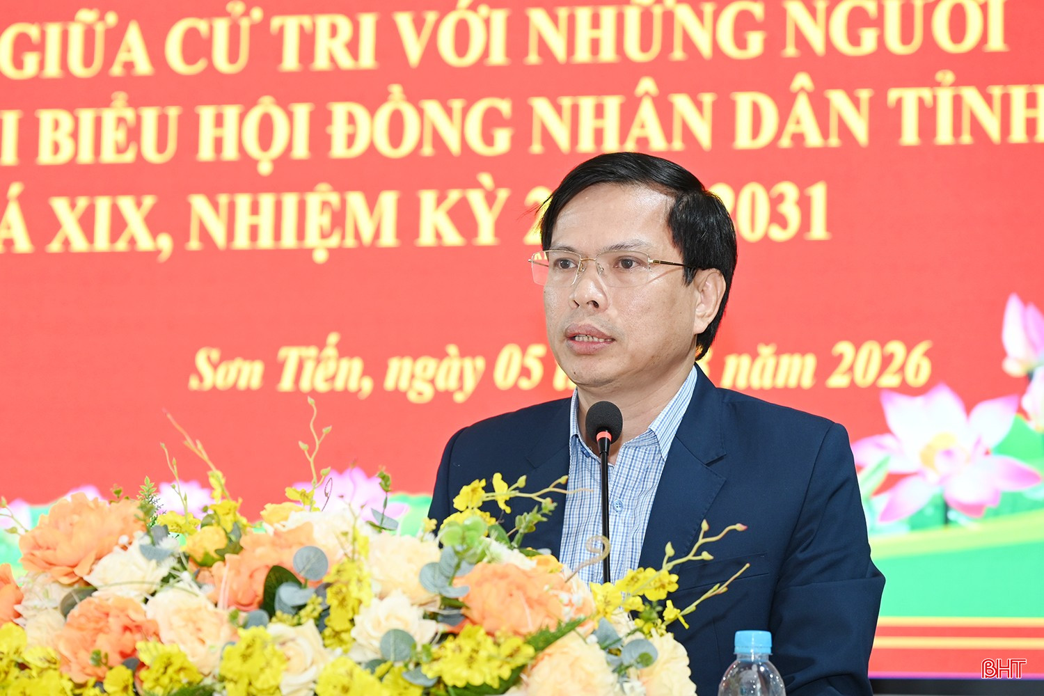 Ông Trần Bình Thân - Bí thư Đảng ủy, Chủ tịch HĐND xã Sơn Tiến trình bày chương trình hành động.