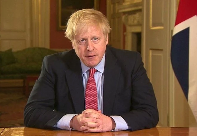 Ông Boris Johnson thông báo tiến hành phong tỏa nước Anh. Ảnh: Reuters. Số ca nhiễm lên 6.650, Anh công bố phong tỏa toàn quốc