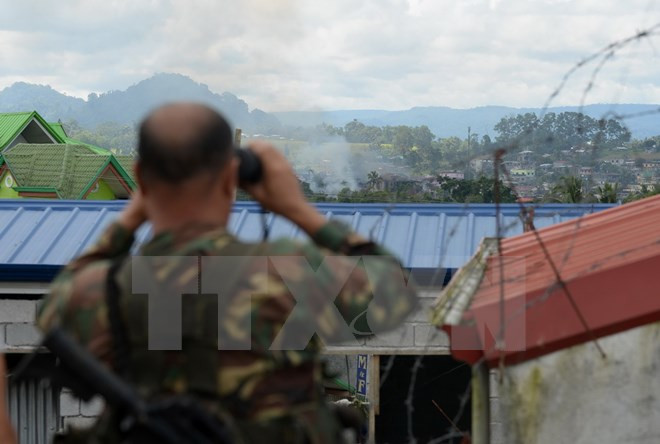 philippines tam dung tan cong vao marawi de dam bao an toan con tin