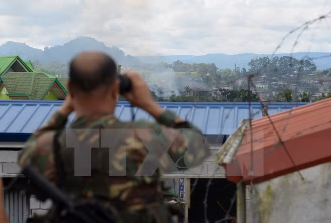 philippines tam dung tan cong vao marawi de dam bao an toan con tin