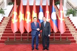 Thường trực Ban Bí thư Trần Cẩm Tú hội đàm với Thường trực Ban Bí thư Vilay Lakhamphong