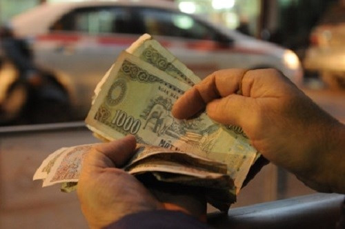 Ngân hàng không được từ chối hoặc thu phí đổi tiền rách nát ảnh 1