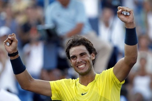 Nadal cười tươi sau khi loại Berdych - Ảnh: Reuters