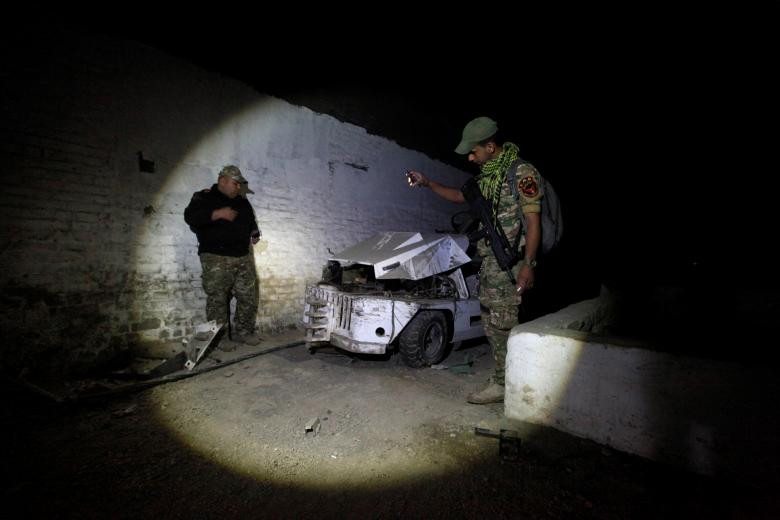 photo muc so thi lo dao tao is duoi long dat o mosul