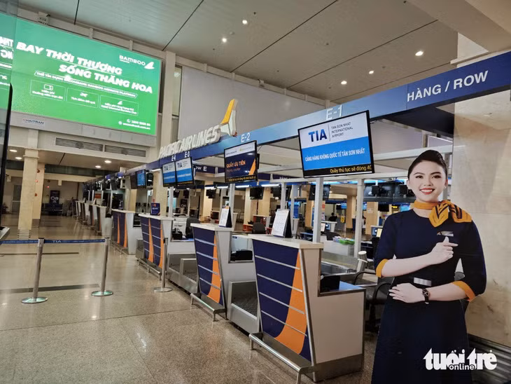 Quầy thủ tục Pacific Airlines vắng lặng sau khi hãng tiến hành trả toàn bộ máy bay do nợ nần - Ảnh: CÔNG TRUNG