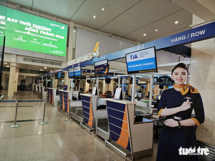 Quầy thủ tục Pacific Airlines vắng lặng sau khi hãng tiến hành trả toàn bộ máy bay do nợ nần - Ảnh: CÔNG TRUNG Quầy thủ tục Pacific Airlines vắng lặng sau khi hãng tiến hành trả toàn bộ máy bay do nợ nần - Ảnh: CÔNG TRUNG