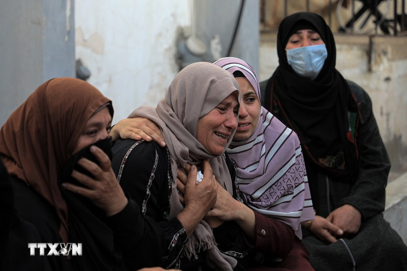 Nỗi đau mất người thân trong cuộc tấn công của Israel vào thành phố Rafah, miền Nam Dải Gaza ngày 21/4/2024. (Ảnh: THX/TTXVN) Nỗi đau mất người thân trong cuộc tấn công của Israel vào thành phố Rafah, miền Nam Dải Gaza ngày 21/4/2024. (Ảnh: THX/TTXVN)