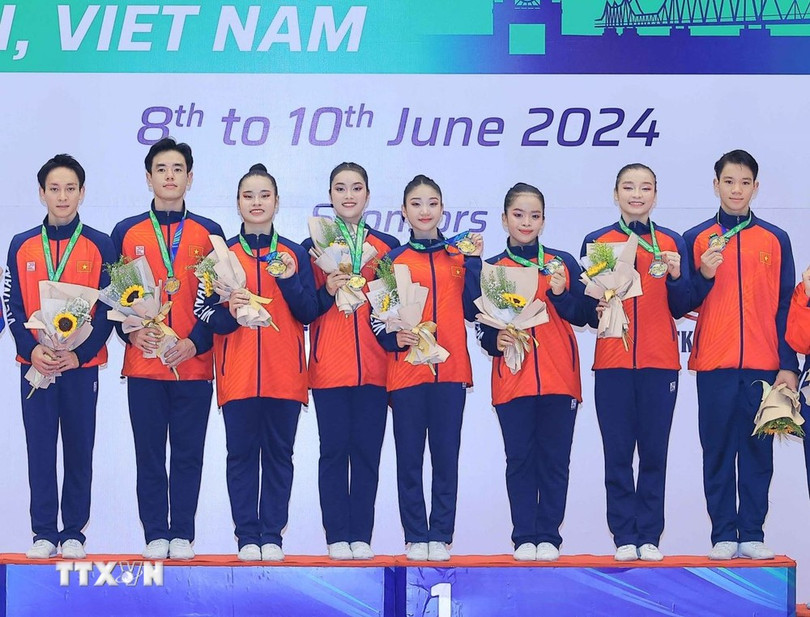 Các vận động viên Việt Nam giành HCV Giải vô địch Thể dục Aerobic châu Á lần thứ 9 nội dung Aerobic Dance lứa tuổi Senior. (Ảnh: Hoàng Hiếu/TTXVN) Các vận động viên Việt Nam giành HCV Giải vô địch Thể dục Aerobic châu Á lần thứ 9 nội dung Aerobic Dance lứa tuổi Senior. (Ảnh: Hoàng Hiếu/TTXVN)