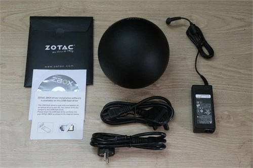 Phụ kiện đi kèm máy cùng hướng dẫn. Mini PC có thiết kế hình khối cầu lạ mắt.