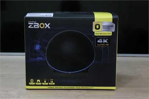 Hộp ZBOX OI 520 mang màu sắc vàng và đen, được giới thiệu hỗ trợ chuẩn 4K Ultra HD.
