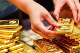 Giá vàng thế giới mất mốc 5.000 USD