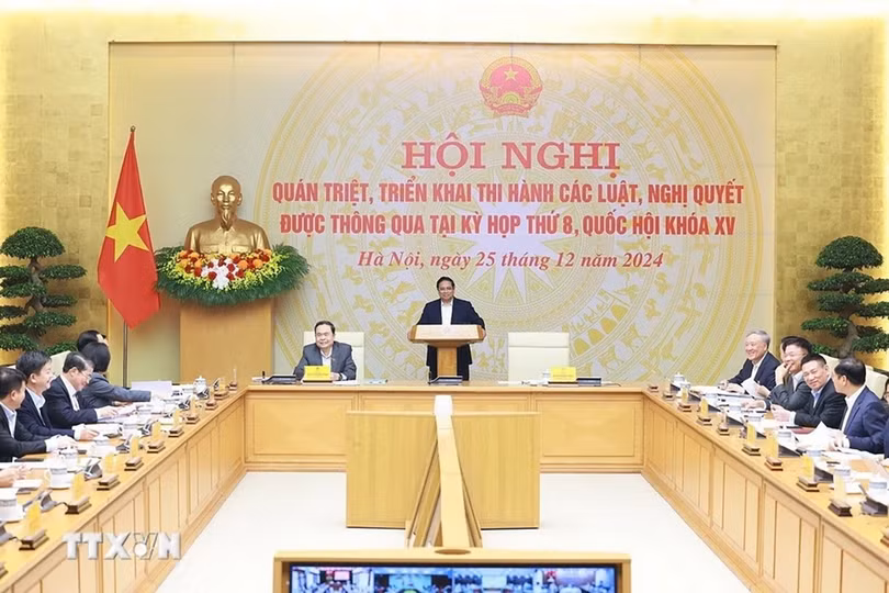 Thủ tướng Chính phủ Phạm Minh Chính và Chủ tịch Quốc hội Trần Thanh Mẫn chủ trì hội nghị. (Ảnh: TTXVN).