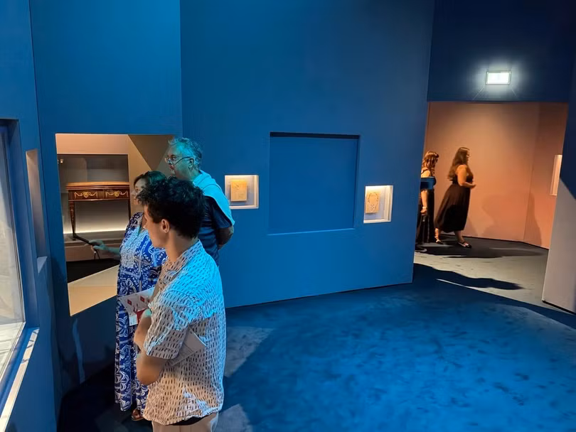 visitors-look-exhibits-near-blue-1103910069-1787976191513.jpg