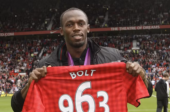 MU chính là đội bóng "Tia chớp đen" hâm mộ nhất. Ảnh: Getty Images. chop den usain bolt thu viec tai dortmund
