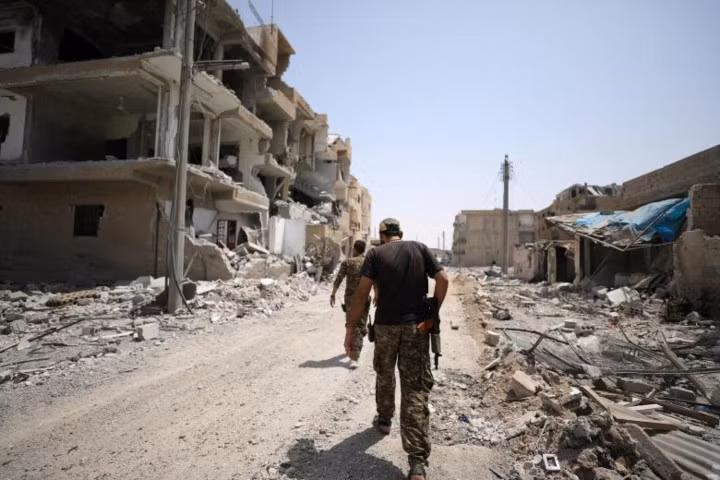 photo cuoc chien quet sach is tai thanh tri raqqa