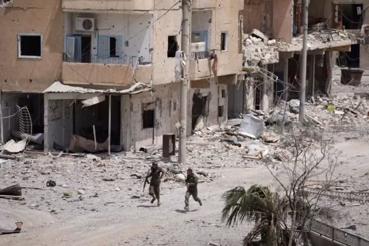 photo cuoc chien quet sach is tai thanh tri raqqa