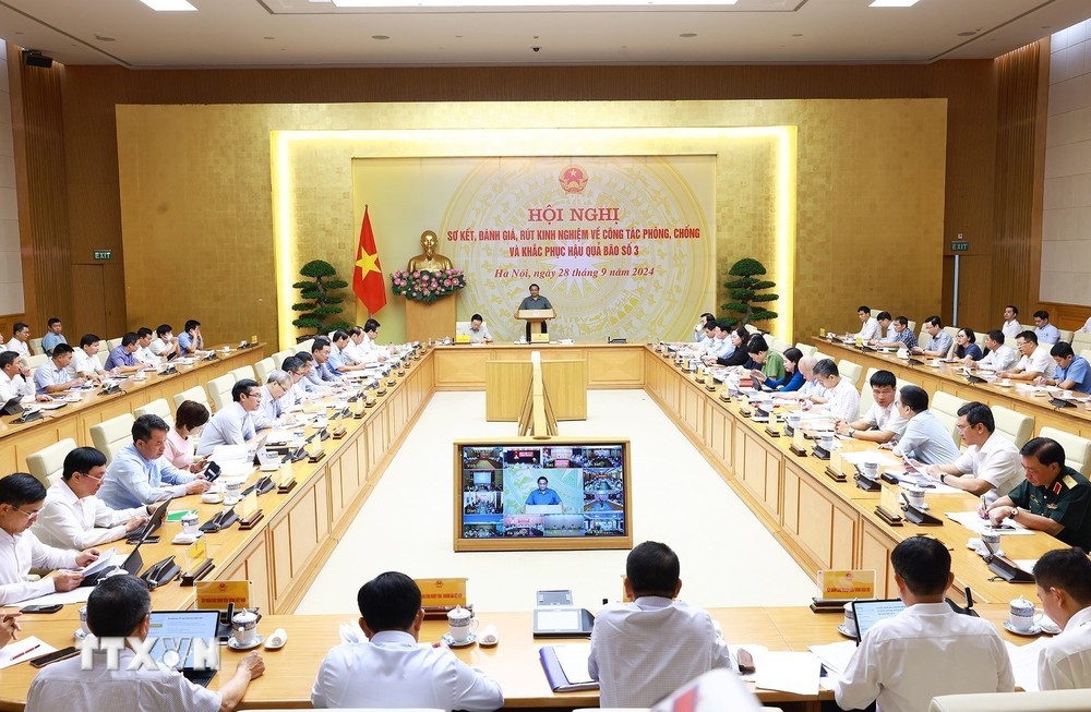 Thủ tướng Phạm Minh Chính chủ trì Hội nghị sơ kết công tác phòng, chống và khắc phục hậu quả bão số 3. (Ảnh: Dương Giang/TTXVN)