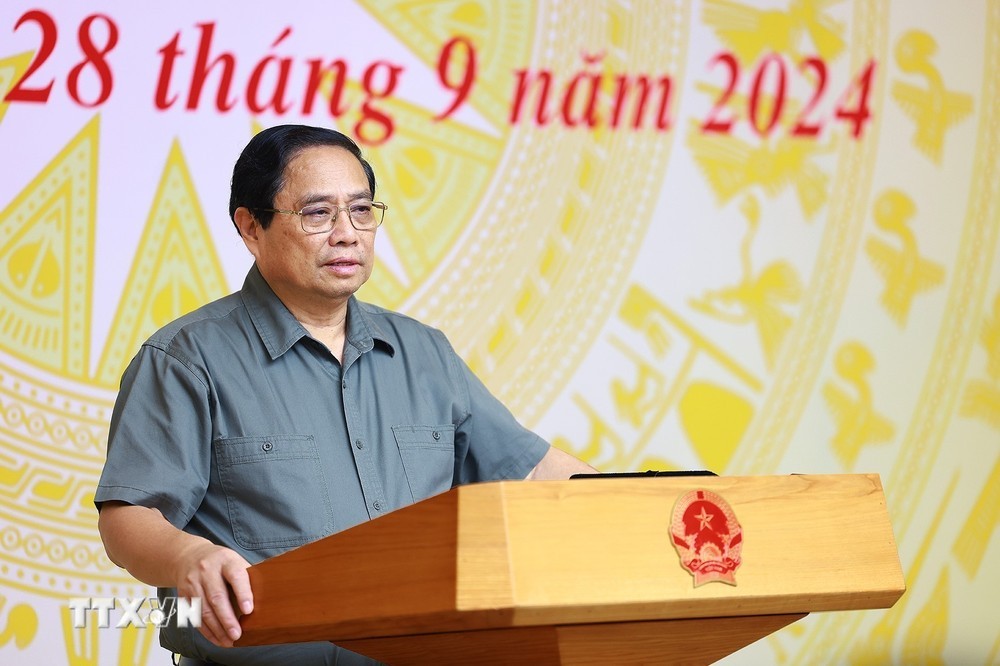 Thủ tướng Phạm Minh Chính chủ trì Hội nghị sơ kết công tác phòng, chống và khắc phục hậu quả bão số 3. (Ảnh: Dương Giang/TTXVN)